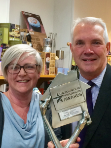 Above: Penny Legg, manager of Hobbs and David Gosling of Eddingtons admire the Excellence in Retailer Initiative trophy inside Hobbs the Kitchen Shop.