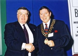 Above: Dave pictured after handing the presidential chain of office to fellow BHHMA member, John Baker in 2002.