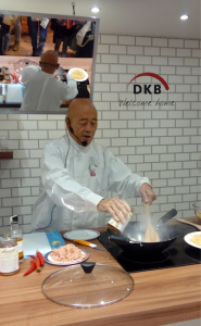 Above: Ken using one of his new woks.