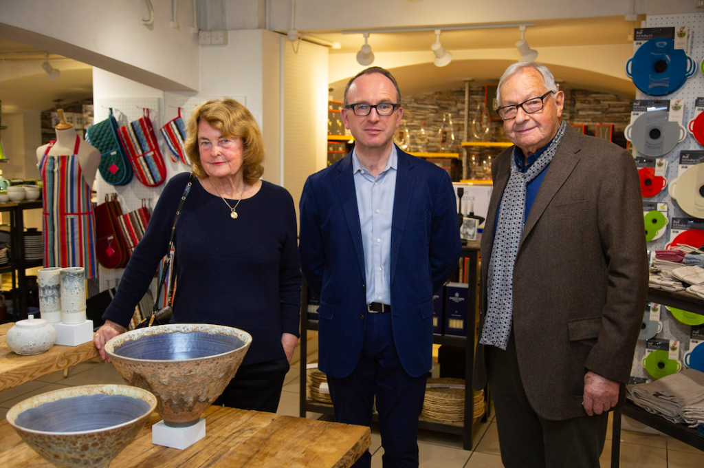 Suzi and Michael Schneiderman (left and right), with Ben Philips (centre).