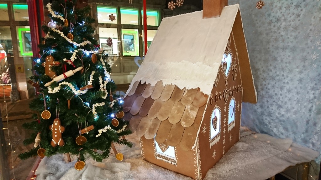 Above: The Christmas Gingerbread window featured a four foot high gingerbread house made from hardwood, saltdough tiles and piped with decorators’ caulking.