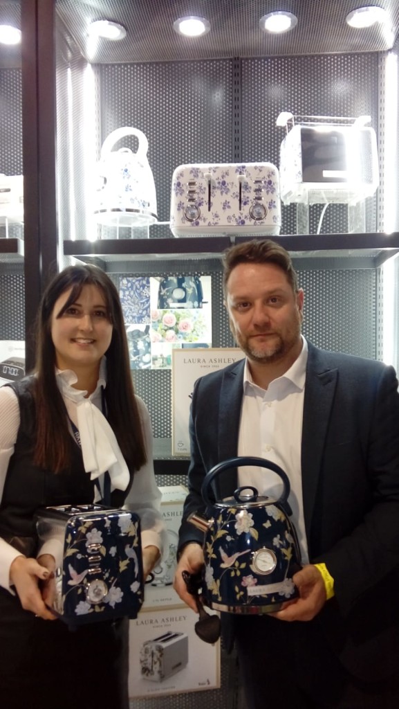 Above: Prints charming: RKW’s Hannah Hawkins and Lee Burton holding Laura Ashley Kettles and Toasters in the classic Elveden pattern, introduced last September.