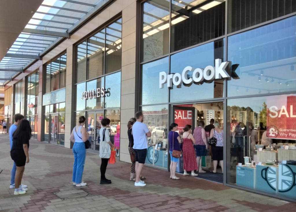 Above: Queues of customers as the doors of the new ProCook store opened.